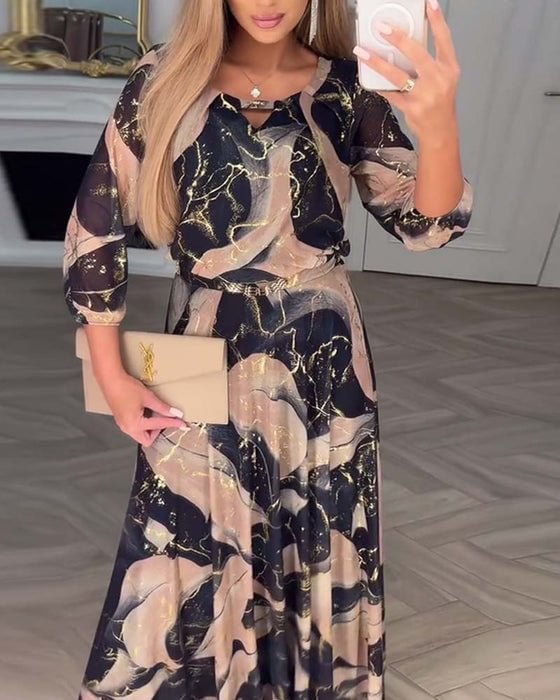 Elegáns sifon ruha nyomtatott mintával és háromnegyedes ujjakkal