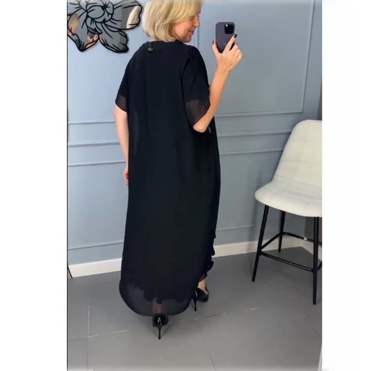 Elegáns, V-nyakú, fekete női ruha, szabálytalan zakóval, kétrészes szett