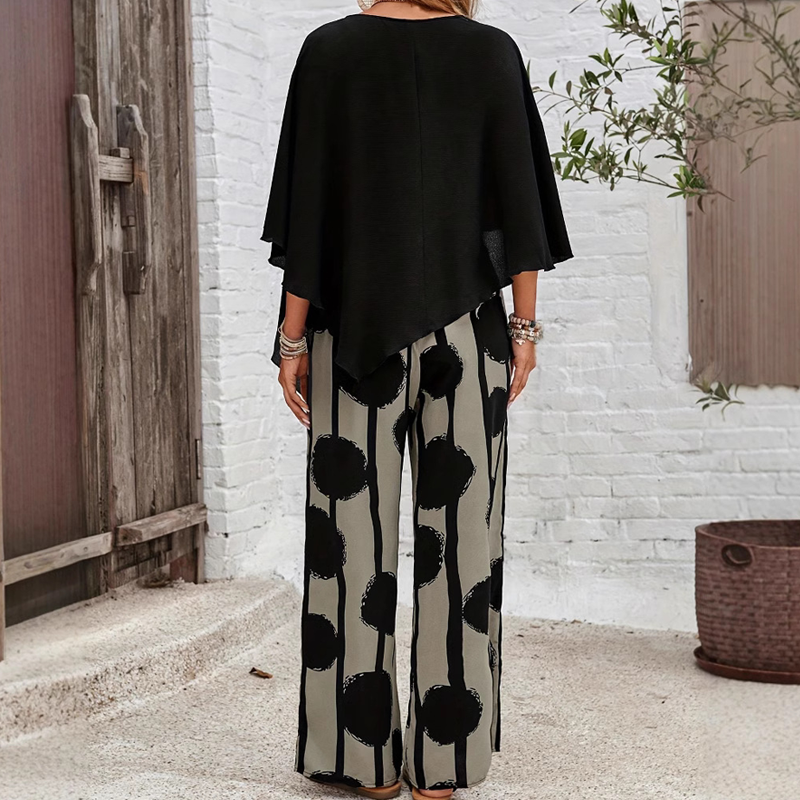 Elegáns szett háromnegyedes ujjú felsővel és mintás nadrággal